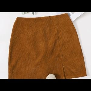 Mini skirt perfect for fall. Brand new.